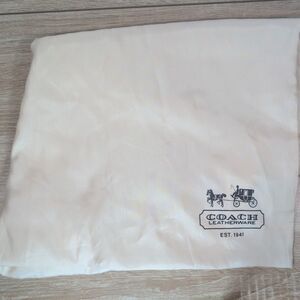 Coach Leatherware dust bag in a classic cream/off-white color Stained 23 x19